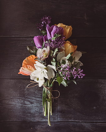 Colorful Spring Flower Bouquet on Dark Wood Background