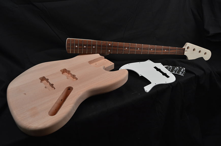 Unfinished bass guitar kit with mahogany neck and hardware