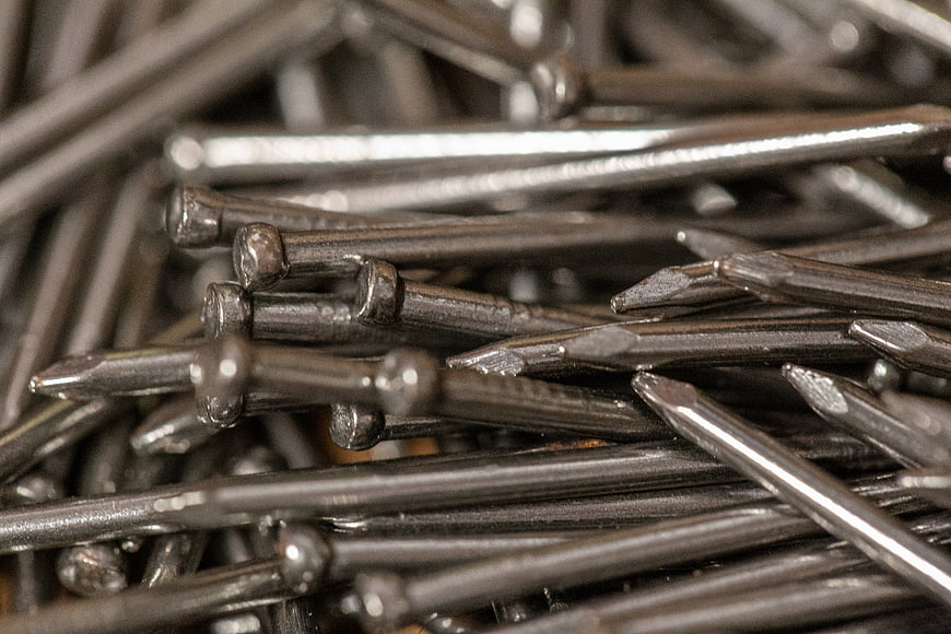 Close-up of shiny steel nails for construction and carpentry