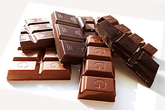 Assorted Milk and Dark Chocolate Bars on White Background