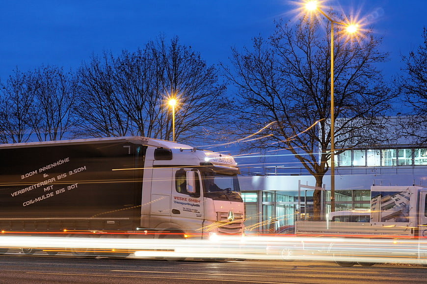 Long Exposure Night Shot of Moving Logistics Truck