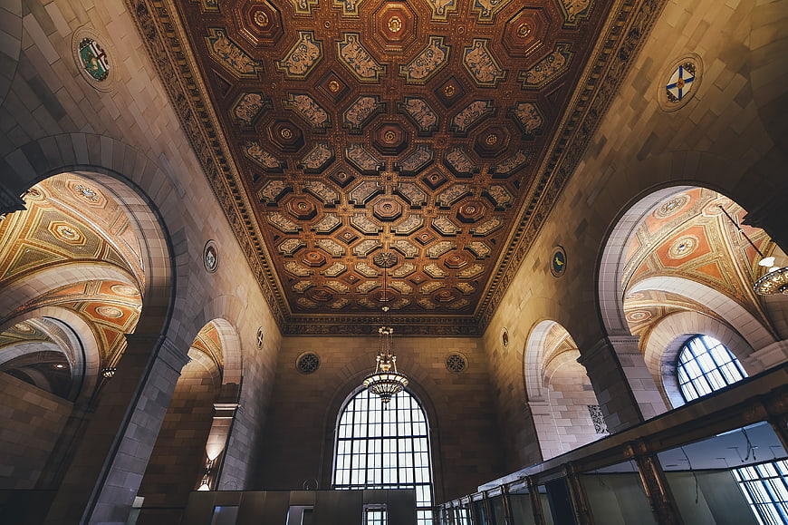 Ornate Beaux-Arts Ceiling with Arched Windows and Decorative Patterns