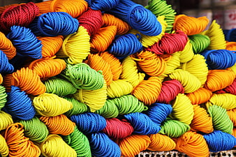 Colorful skeins of yarn in vibrant rainbow colors