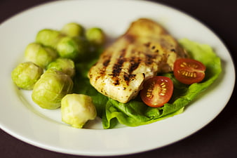 Grilled Chicken Breast with Brussels Sprouts and Tomatoes
