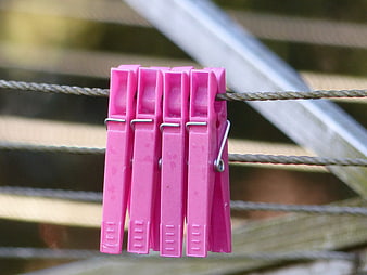 Pink Plastic Clothespins on a Wire