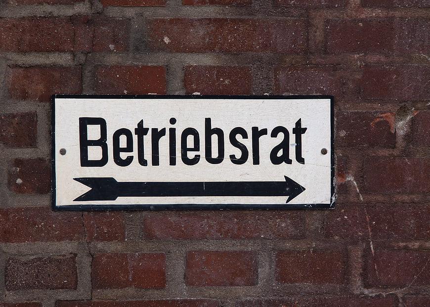 Vintage Betriebsrat Sign On Weathered Red Brick Wall
