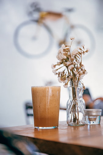 Healthy Smoothie and Dried Flowers on Wooden Table