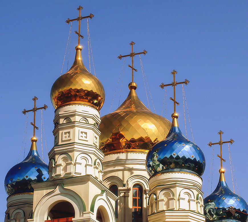 Golden and Blue Orthodox Church Domes Against Blue Sky