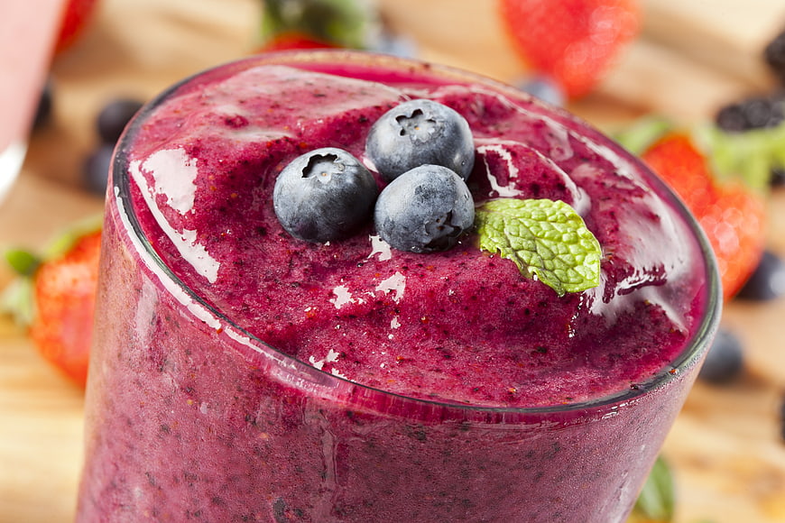Fresh Blueberry Smoothie Garnished With Berries And Mint