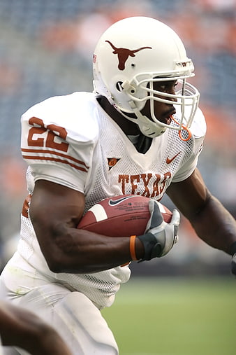 Texas Longhorns Football Player Running with Ball