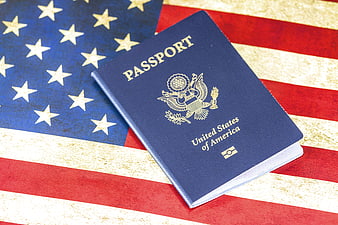 US Passport on Vintage American Flag Background
