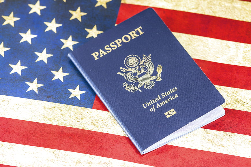 US Passport on Vintage American Flag Background