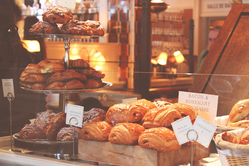 Fresh Croissants and Pastries in Bakery Display Case