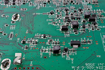 Macro View of Green Printed Circuit Board with Electronic Components