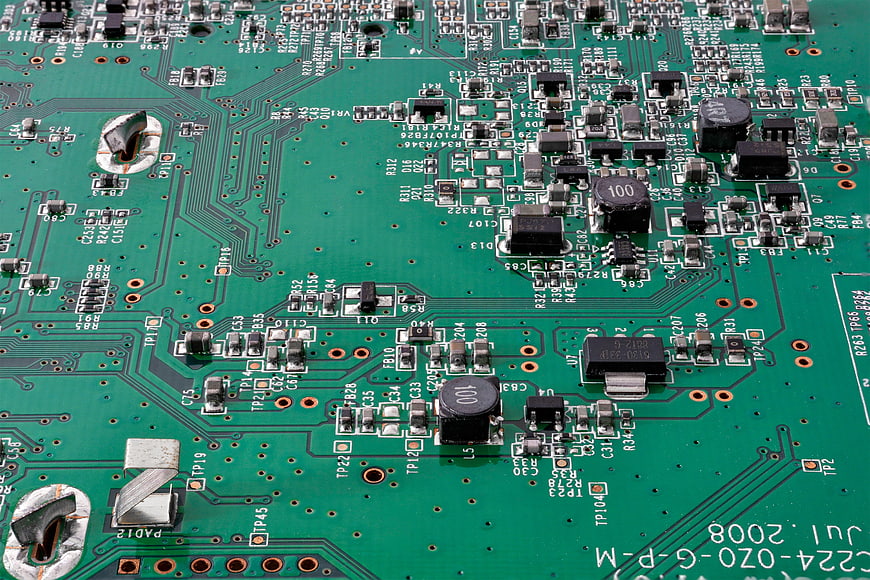 Macro View of Green Printed Circuit Board with Electronic Components