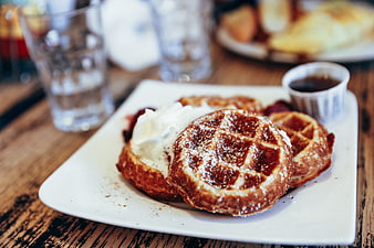 Golden Belgian Waffles with Whipped Cream and Syrup