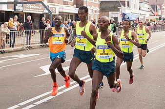 Male Marathon Runners Competing in Street Race