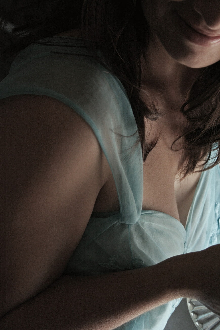Moody Close-Up of Woman in Light Blue Dress