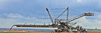Gigantic Bucket Wheel Excavator Operating In Open Pit Mining Site