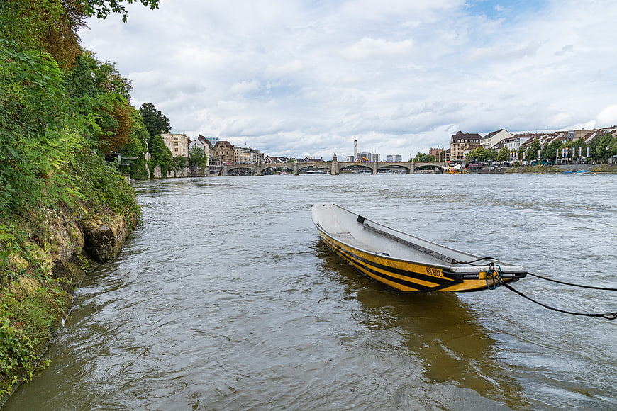 Yellow rowboat moored on the Rhine river in Basel