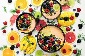 Top View of Colorful Smoothie Bowls with Fresh Fruits