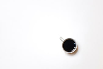 Minimalist Top View of Black Coffee in White Cup