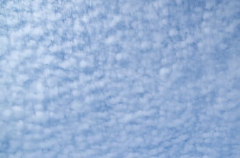 Soft Blue Sky with Mammatus Cloud Texture Background