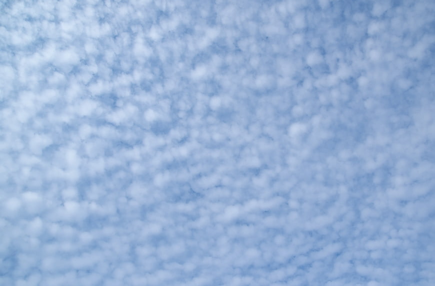 Soft Blue Sky with Mammatus Cloud Texture Background