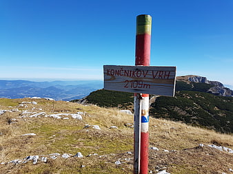 Končnikov Vrh Mountain Summit Sign in Slovenia