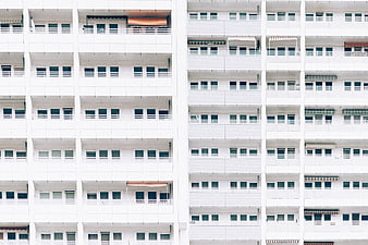 Minimalist White Apartment Building Facade with Balconies