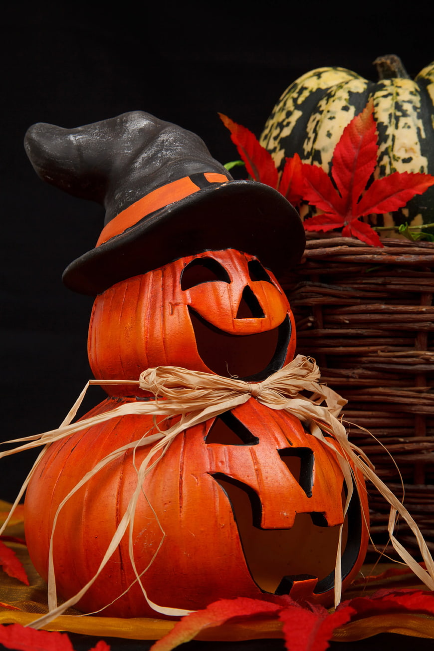 Stacked Wooden Jack-o'-lanterns with Witch Hat and Straw