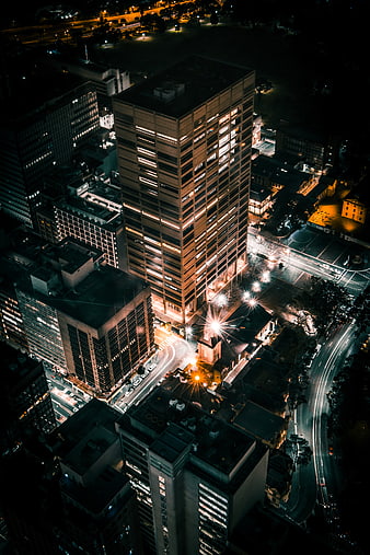 Aerial Night View of Urban Cityscape with Light Trails