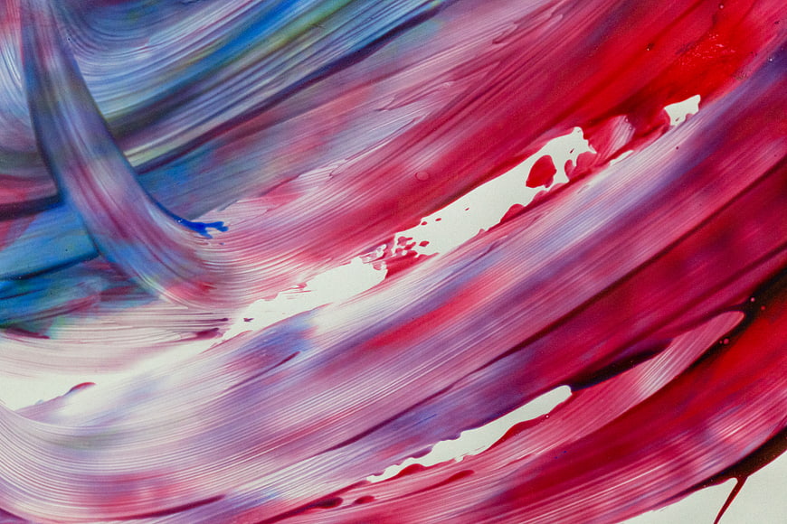 Abstract Swirling Pink and Blue Paint Texture Close Up
