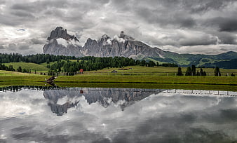 Dramatic Dolomites mountain reflection in alpine lake