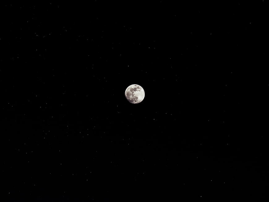Gibbous Moon and Starry Night Sky