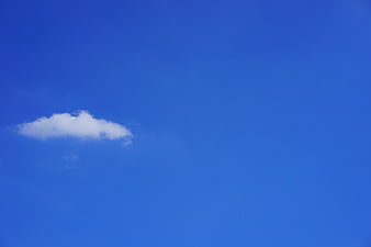 Single White Cloud in Blue Sky