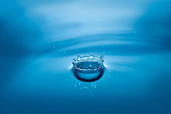 Blue Water Drop Splash Crown on Liquid Surface