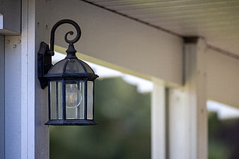 Vintage Black Lantern on White Porch Column