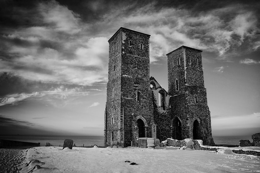 Reculver Towers Ruins in Snowy Winter Landscape