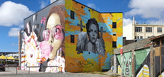 Colorful Urban Street Art Murals on Building Exterior