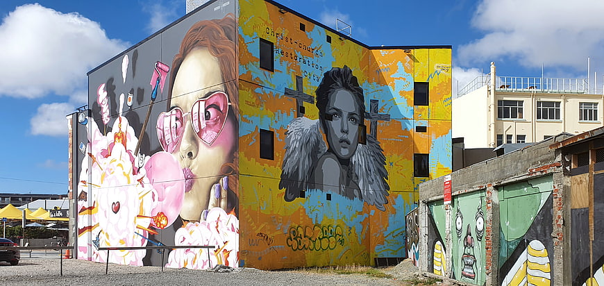 Colorful Urban Street Art Murals on Building Exterior