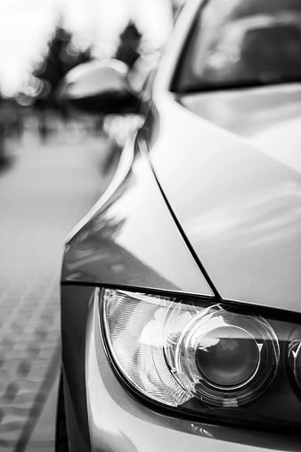 Close-up of Car Headlight in Black and White