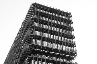 Low angle view of modern high-rise building with glass facade