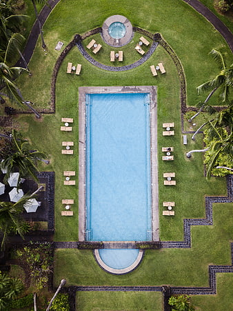 Aerial View of Luxury Resort Pool with Lounge Chairs