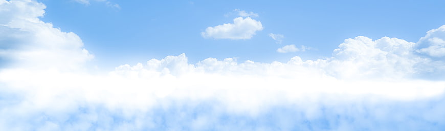 Panoramic Blue Sky with Fluffy White Clouds