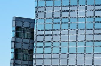 Modern Glass Skyscraper Facade with Blue Windows