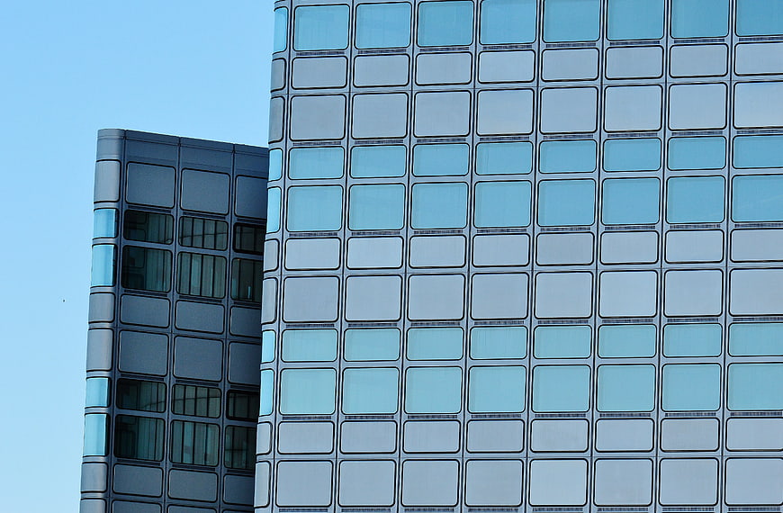 Modern Glass Skyscraper Facade with Blue Windows