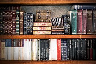 Vintage Books on Wooden Bookshelf