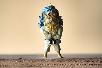 One Piece anime character figurine standing on wooden surface