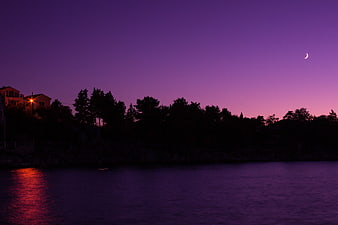 Crescent Moon Over Purple Twilight Sea Landscape
